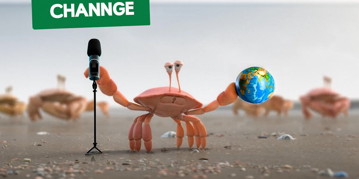 Crabon Footprint: How To Stop Global Clawming - crab on mic on the beach